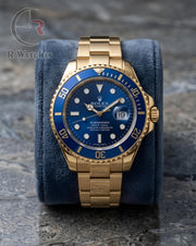 (OS) Rolex Submariner gold blue dial